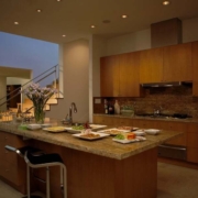 A luxury kitchen with Lutron lighting solutions.